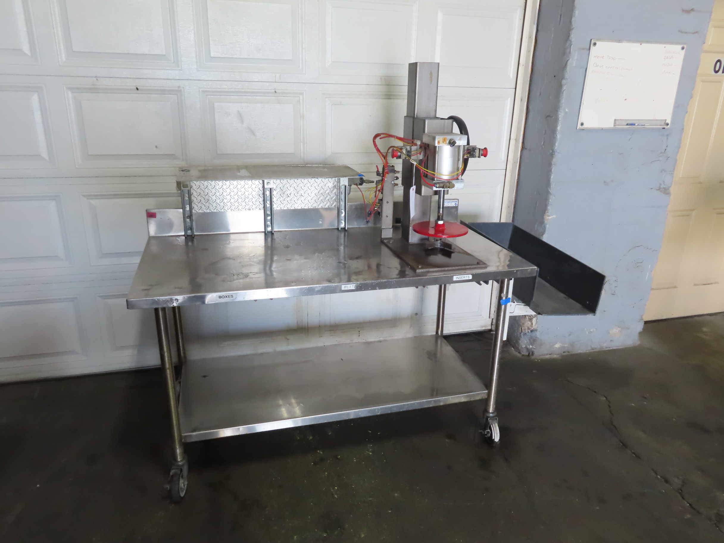 Crandall Pneumatic Pail Lid Closer on Table