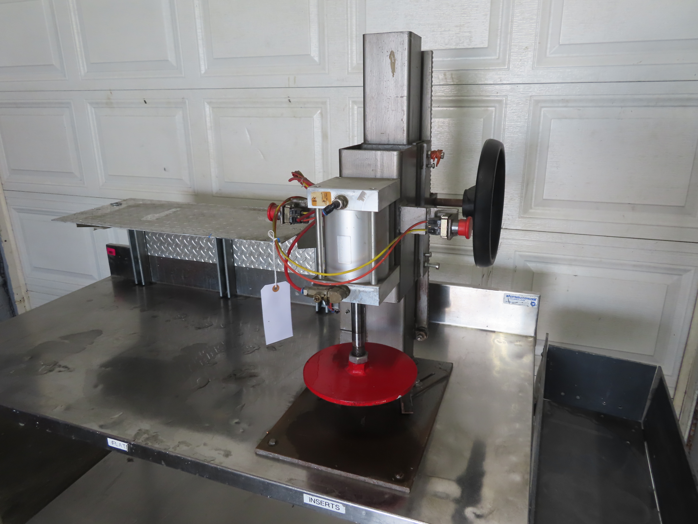 Crandall Pneumatic Pail Lid Closer on Table